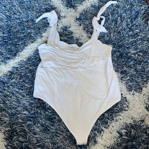 White bodysuit with tie shoulders